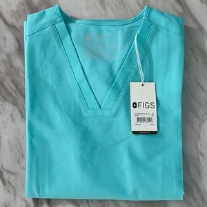 FIGS brand new scrub top XS Casma aqua 3 pocket